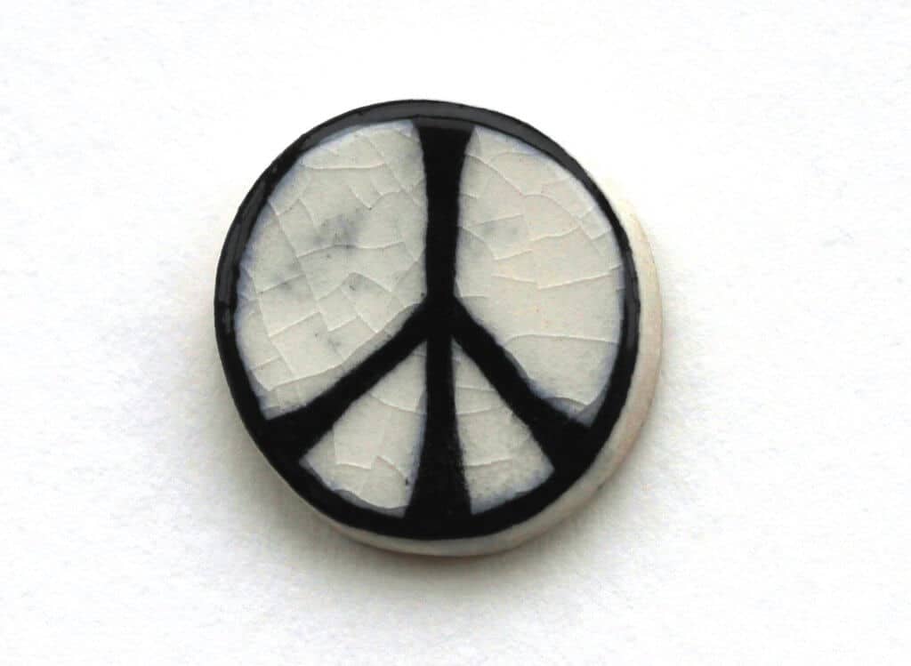 As made by Eric Austen, the first badge featuring the CND logo