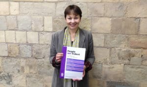 Caroline Lucas MP holds CND's People not Trident briefing paper.