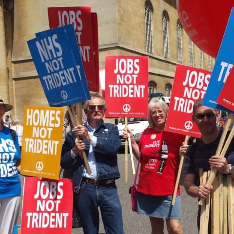 Protestors with anti-nuclear placards