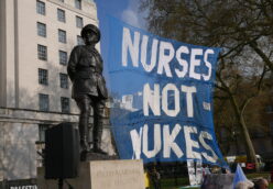 Banner outside the Ministry of Defence that reads "Nurses Not Nukes"